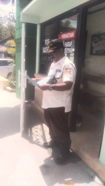 Satpam JDP berjaga di pos